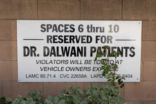 We have dedicated parking for our patients in the parking lot behind our building. Parking spaces #6-10 are designated for our patients.