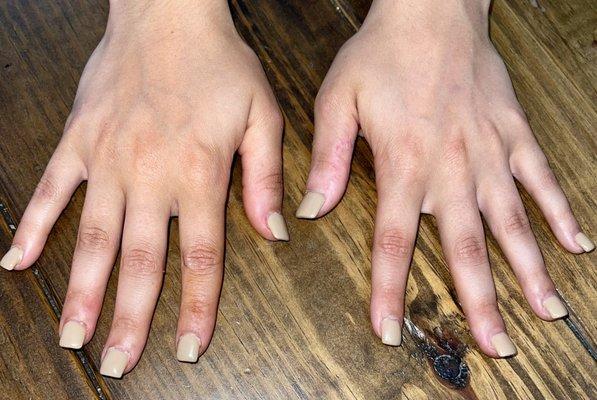 Half of the nails aren't completely filled in and half of the nails the cuticles are even painted.