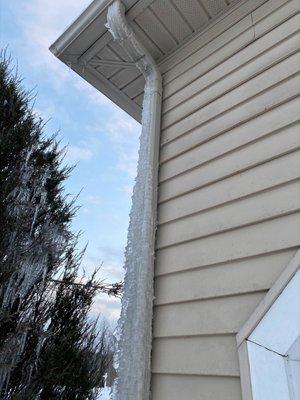 Frozen gutter due to ACG leaving plumbing exposed in the winter.