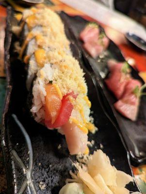 Iza Crunch Raw Specialty Roll. $14. Cucumber, tuna, salmon, yellowtail, shiso, spicy mayo, tempura crunch.