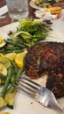 Bacon wrapped meatloaf and veggies a jour