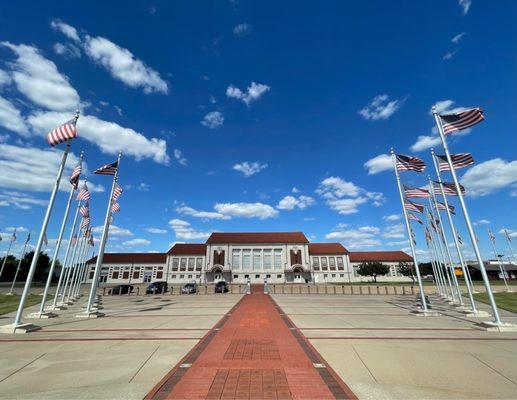 Front of the station viewed from the promenade of U.S. flags