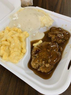 Salisbury steak, mac and cheese, mashed potatoes and gravy