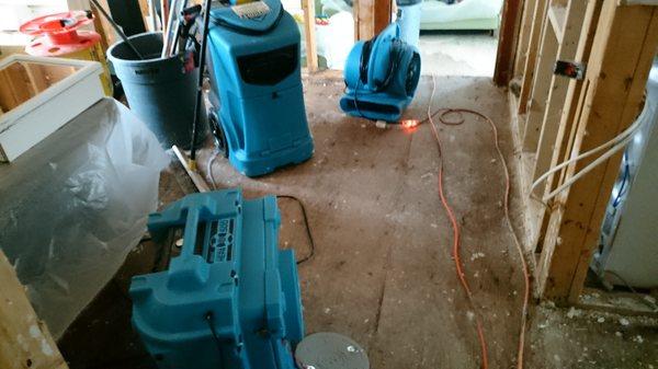 Flooded home drying equipment installed