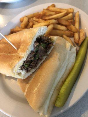 Philly cheese steak -- mine no onions -- and great well done fries. $5.99!