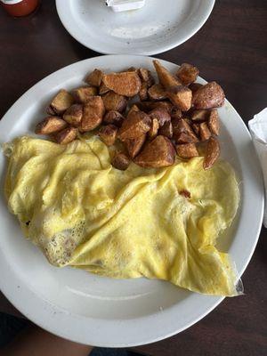 Shrimp omelette with home potatoes