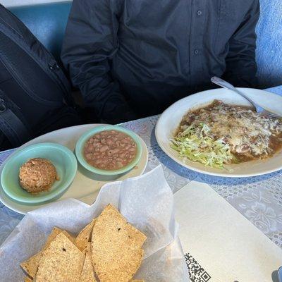 Cheese & onion enchiladas with green sauce are vegetarian