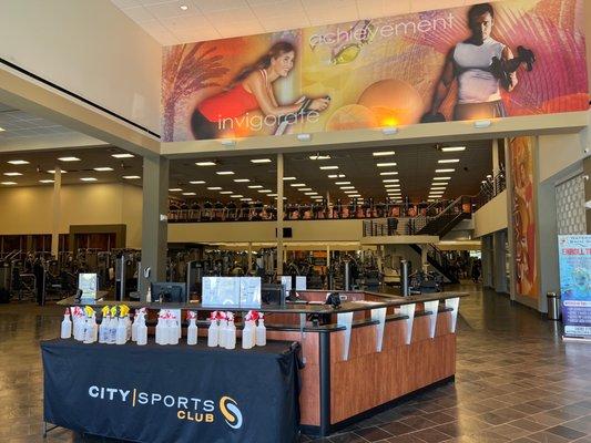 The entryway of the gym. Love how they have a bunch of sanitization bottles available to use.