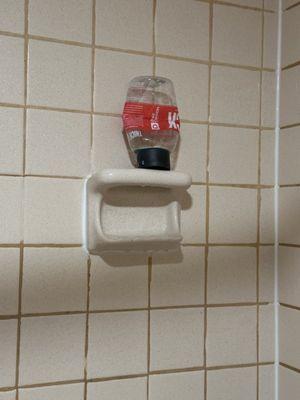 Soap bottle left in shower