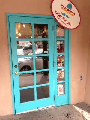 Front door at the side of La Fonda building.