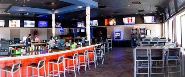 Renovated Interior Bar with juke box TV's, darts, and high top tables at SoHo Saloon, South Tampa