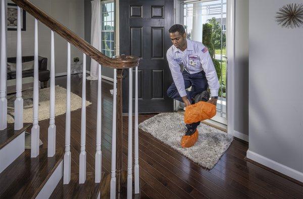 Shoe covers are worn on every job to protect your floors and your home.