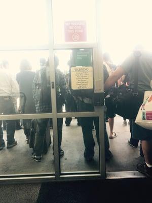 Commuters waiting to board planes to LAX