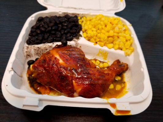 1/4 dark meat chicken with corn and black bean sides