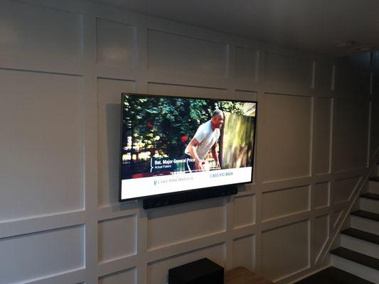 Another TV mounted in the living room. No wires. Perfect installation!