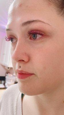 Pink eyelash extensions