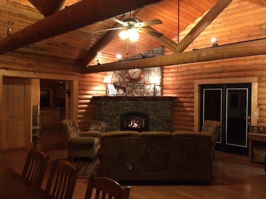 The Lodge's Main Room with two sitting areas and two dining tables.