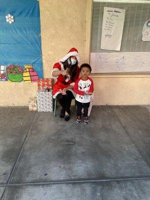 My son with this year's Santa before his Christmas performance.