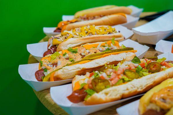 Assortment of Speciaty Hot Dogs including the Barbie Dog, Slaw Dog, Big Mike Dog & Nacho Dog