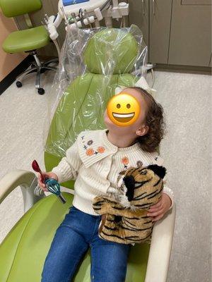 They gave her a tiger to put her at ease meanwhile Cocomelon was also playing on the ceiling. She felt so comfortable and right at home!