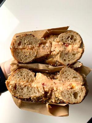 Pimento cream cheese on an everything bagel