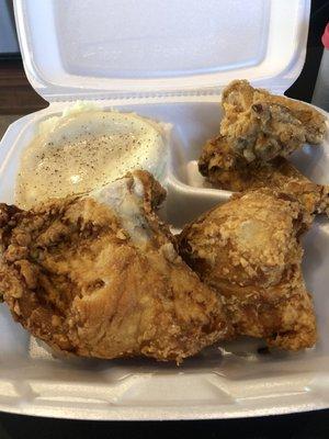 1/2 fried chicken with mashed potatoes and gravy just like Mom makes