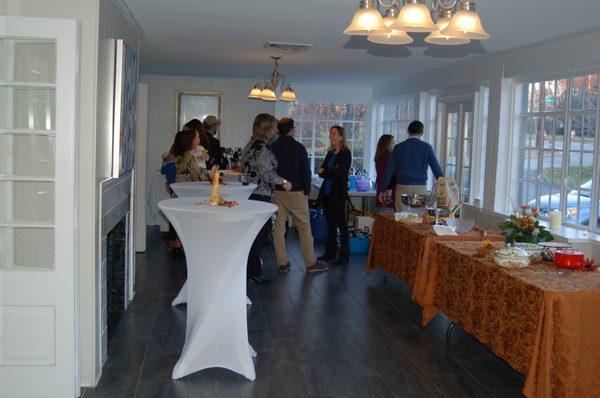 The sunroom is perfect for cocktails and the buffet.