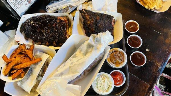 All the bbq stuff I got. Sweet fries. Beef ribs. Pull pork sandwich. Brisket. Baby back ribs