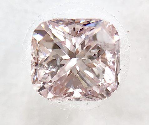 Pink diamond with cushion cut.