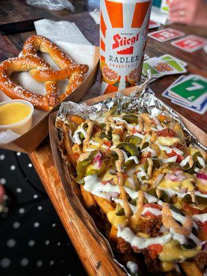 Loaded chili fries and a soft pretzel.