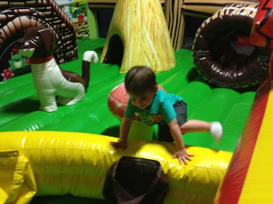 Caleb in the bounce house for 4 and under.