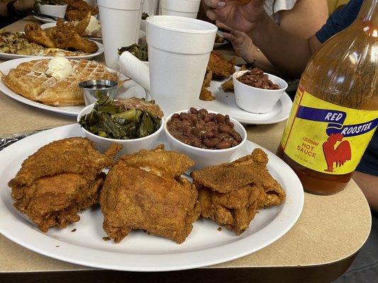 Fried chicken with collards and red beans and rice