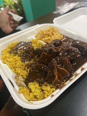 Ox  Tails with yellow rice and extra gravy