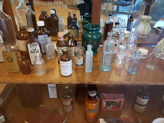 Neat display of antique apothecary equipment.