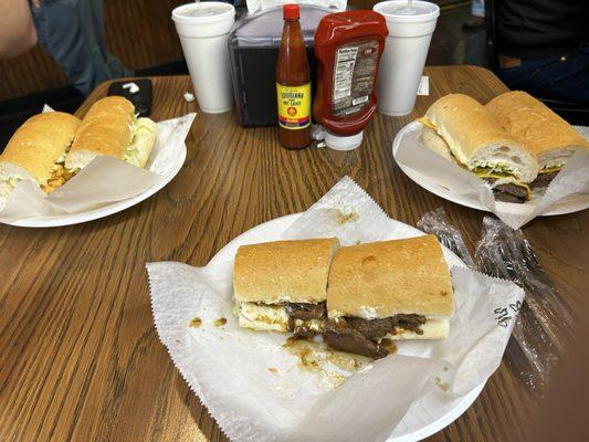 Roast beef, shrimp, and cheeseburger poboys