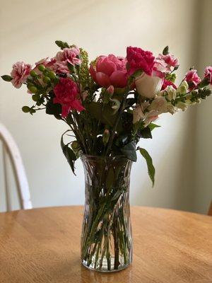 Flat topped bouquet , stems cut one length.