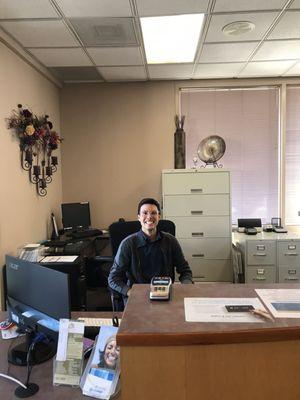 This is Adrian, the front office staff person, who greets us with a smile!