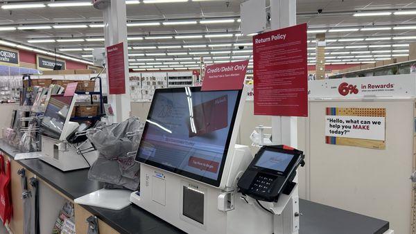 Inside: Check out the massive screens on the self check out kiosks. They put my WFH set up to shame.