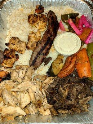 Part of the sampler for 2 - Chicken Shawarma, Lamb Shawarma, Shish Tawook and Shish Kafta with rice