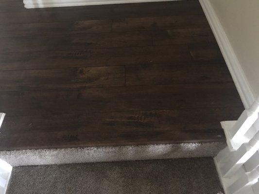 Laminate wood and carpet on stairs