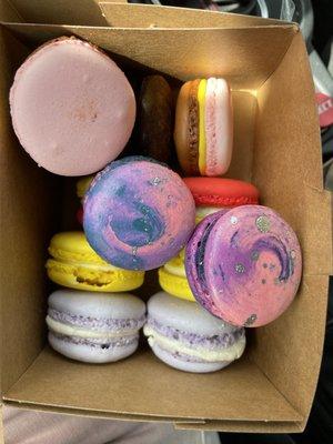 A dozen French macarons. Pictured as packaged from bakery.