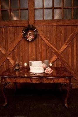 Beautiful wooden table and doors in the ballroom.