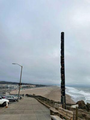 The totem pole commissioned by George Whitney, Sr. was made from one long cedar log and depicted various members of the Whitney family.