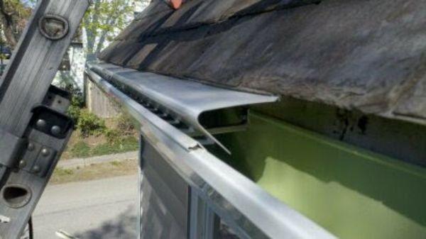 Maintenance free/Lifetime warranty gutter protection! installed on a metal shingle roof