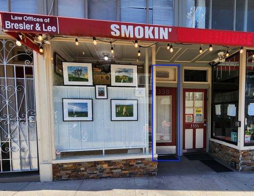 The red door on the left is their office.