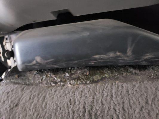 Melted carpet under the front console.