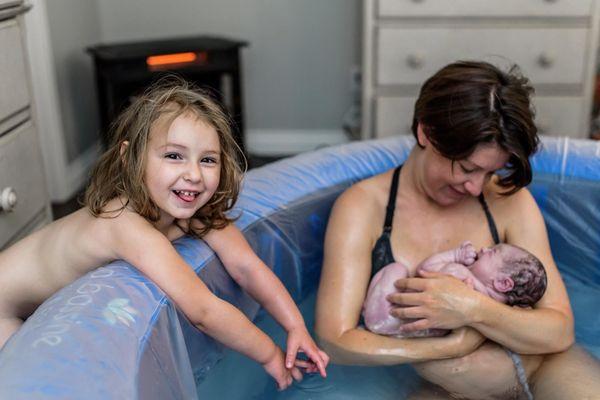 Big sister really wants to get in the pool!