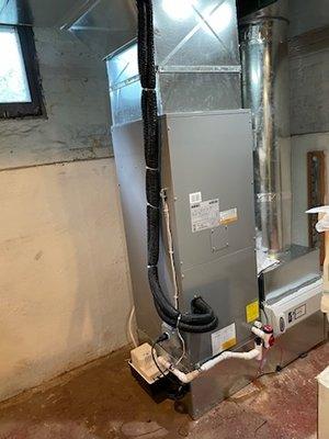 Ducted air handler paired with a mini split condenser