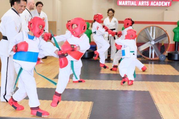 Sparring green belts.