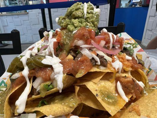 Carne asada nachos with everything